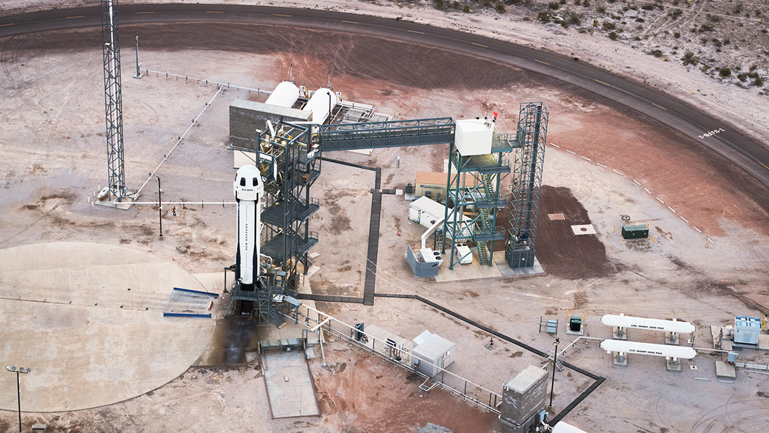 aerial view of a rocket standing on its launch pad in Texas